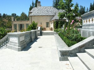 Materials: Finished Granite; Carved Stone Pedestals